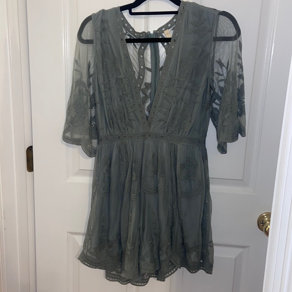 Beautiful green lace with slip v neck romper